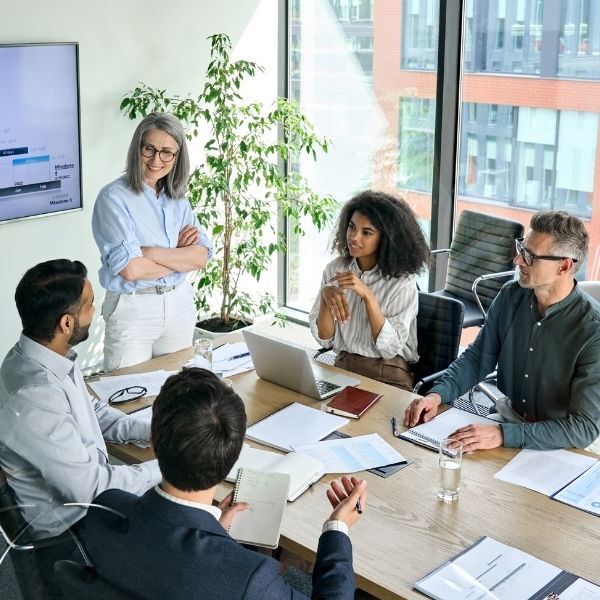 Nonprofit leadership board meeting to review organizational plans